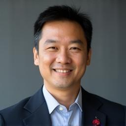 Professional headshot of Mr. Tan Wei Ming.